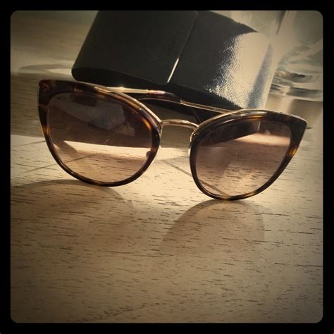 havana brown prada sunglasses|prada pr 01os sunglasses.